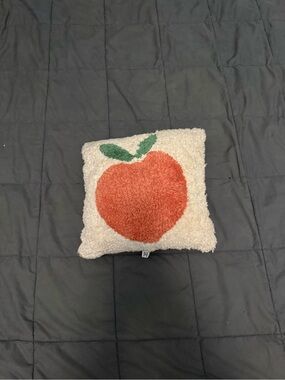Urban Outfitters home peach throw pillow